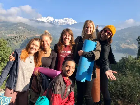 Group meditation session during Panchase yoga trek in Nepal